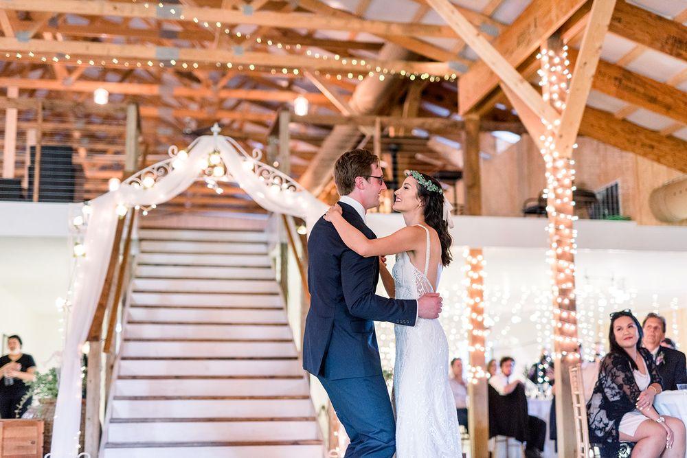 A first dance beneath the barn lights